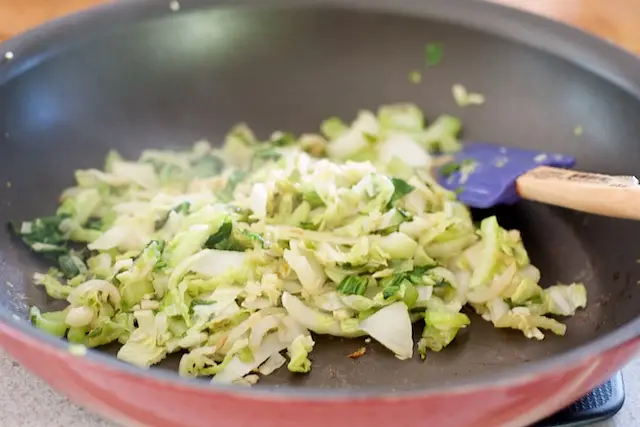 Stirring, and cook for another 3 to 4 minutes, until stems are tender and leaves are wilted.