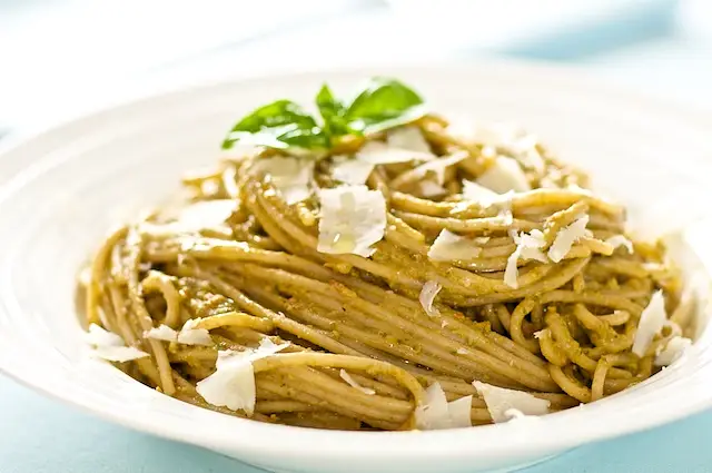 Here we have the pesto pasta on the plate, sprinkle some parmesan on top, and enjoy!