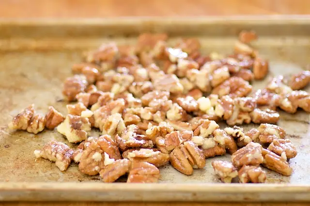 Place the pecans on a baking sheet
