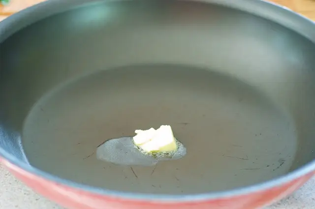 In a large nonstick skillet, melt the butter over medium-high heat. 