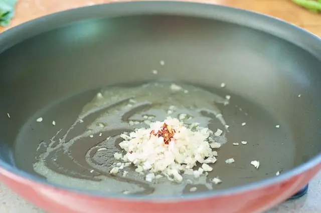 Add the shallots, stirring, and cook for 2 to 3 minutes until soft. 