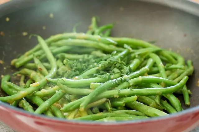 Add the freshly minced sage leaves.