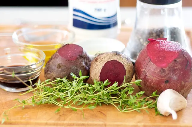 First get together beets, thyme, balsamic vinegar, olive oil, garlic, salt and black pepper.