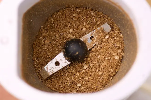 Grind until the seeds are almost finely ground.