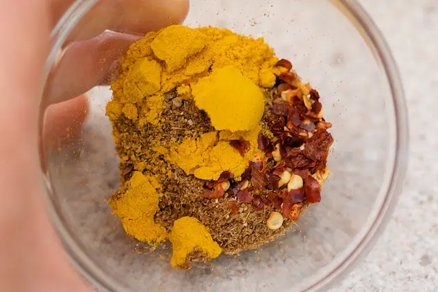 Add all the spices into a small bowl.