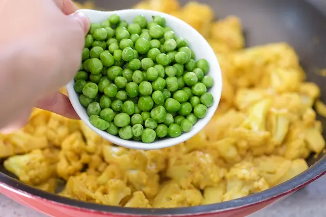 Add the peas.