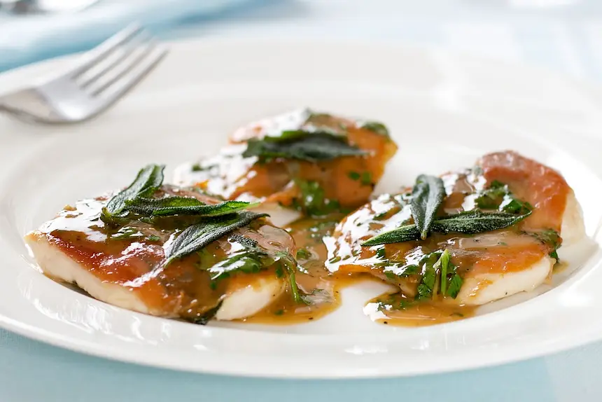 Top with sauce and fried sage leaves if desired