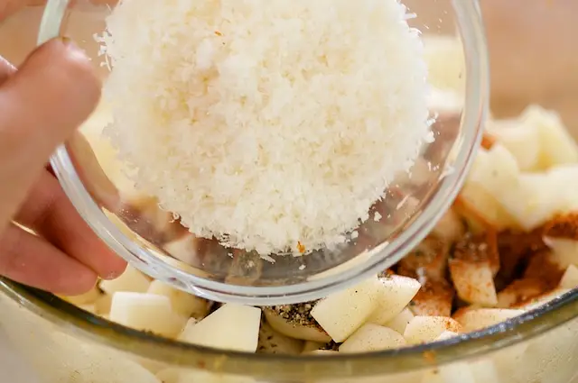 Add freshly grated parmesan cheese.