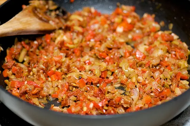 Give it a good stir until well mixed, season with some freshly ground black pepper.