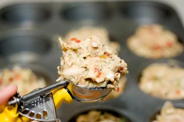 Spoon the batter into each muffin cup.