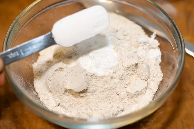 Add the flour and baking powder into a small bowl, 