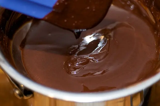 Stir until butter and chocolate are melted, and the mixture becomes smooth. 