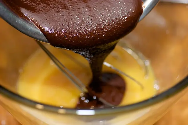 Pour in the chocolate mixture.