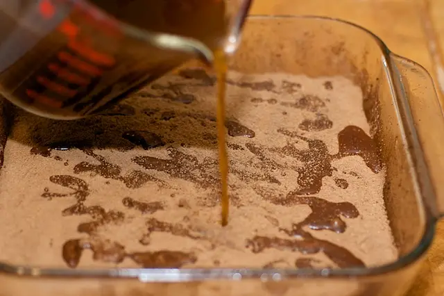 Pour the coffee slowly from spot to spot.