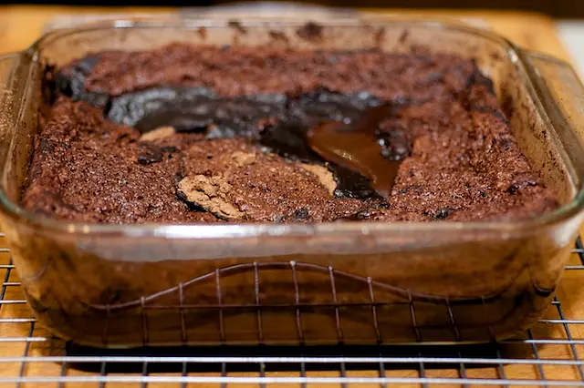 Bake the cake until it’s puffed, bubbling and just start pulling away from the sides of baking dish, 44 to 46 minutes. 