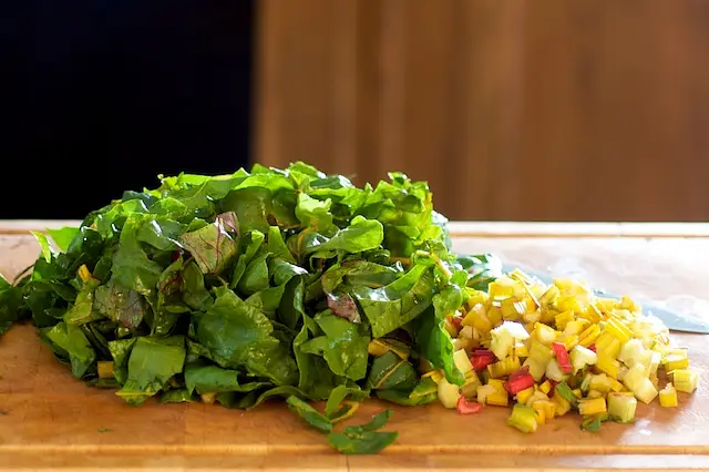 Chop the leaves roughly and slice the stems into about ½-inch pieces.
