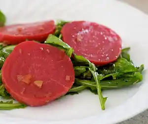 Heirloom Beets, Warm Goat Cheese, Arugula with Green Olive Vinaigrette