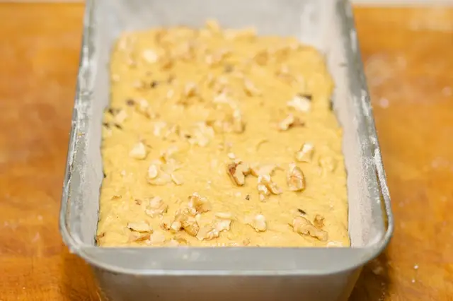 Pour the batter into the loaf pan.