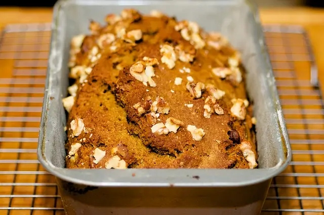 Bake in a 350 degrees F for 45-50 minutes until a woonden stick inserted center comes out almost clean. 