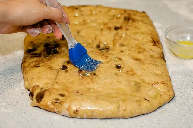 Roll the dough into an 18-inch x 9-inch rectangle.