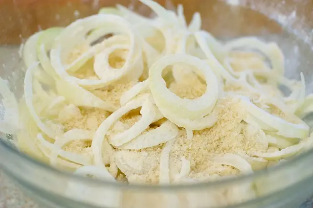 Add the onions, flour, panko and salt in a large mixing bowl