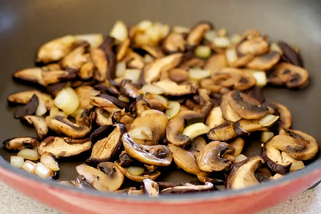 and cook, stirring occasionally, until the mushrooms begin to release some of their liquid, 4 to 5 minutes.