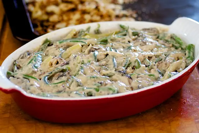 Transfer the mixture into a cast-iron <a href="/how-to/baking-pan-and-dish-volume-guide" title="Baking Pan and Dish Volume Guide">baking dish</a> .