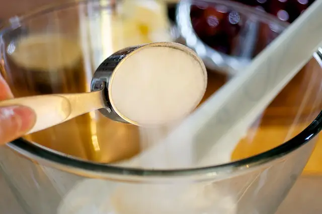 In a medium bowl, add the sour cream, the sugar,