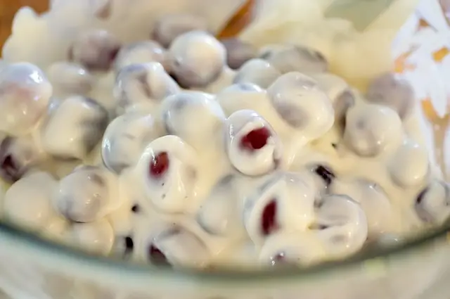 Add the grapes and gently stir until well coated.