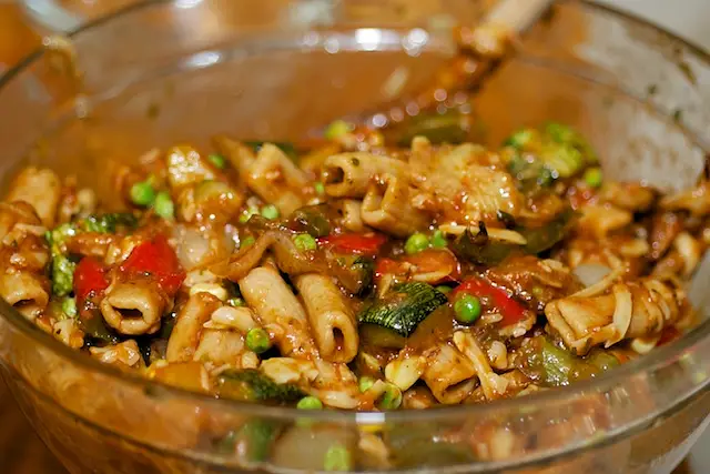 Using a wooden spoon, gently mix,