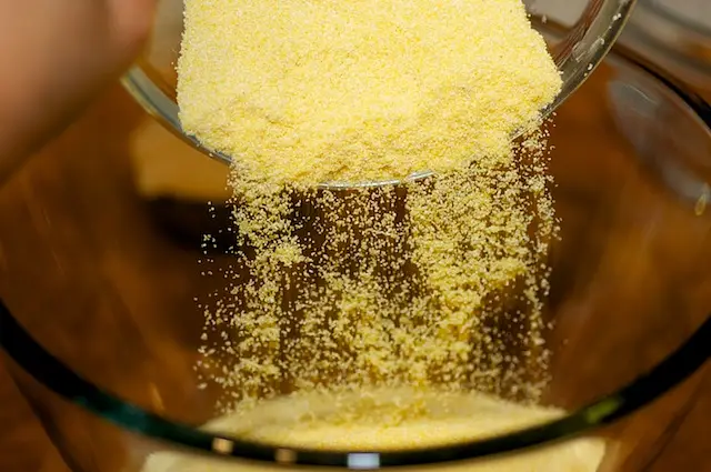 In a large bowl, add the cornmeal.