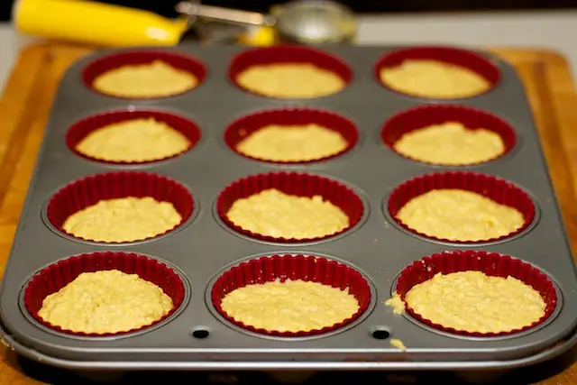 Fill 12 greased muffin pans ⅔ full.