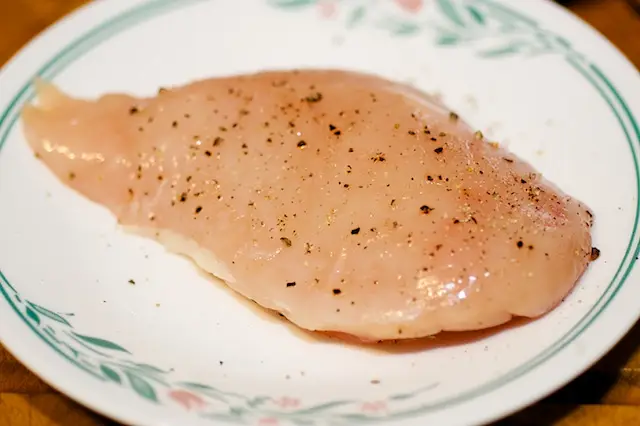 Season the chicken breasts