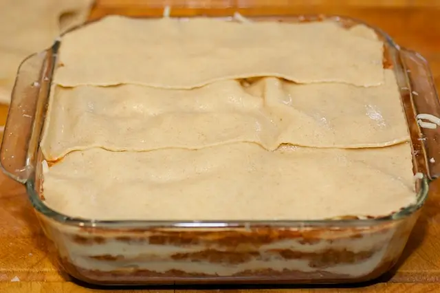 Lay the final 3 noodles over the cheese.