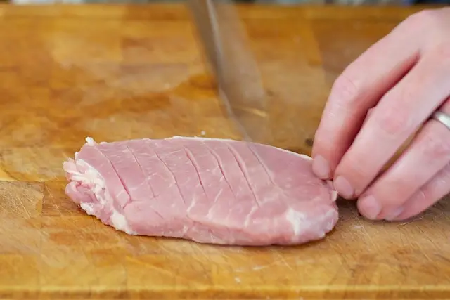 Score the pork chop