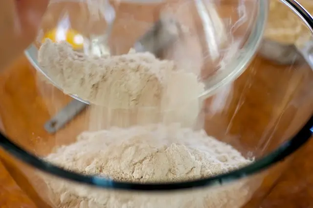 In a large bowl, add the yeast mixture, whole wheat and all-purpose flour.