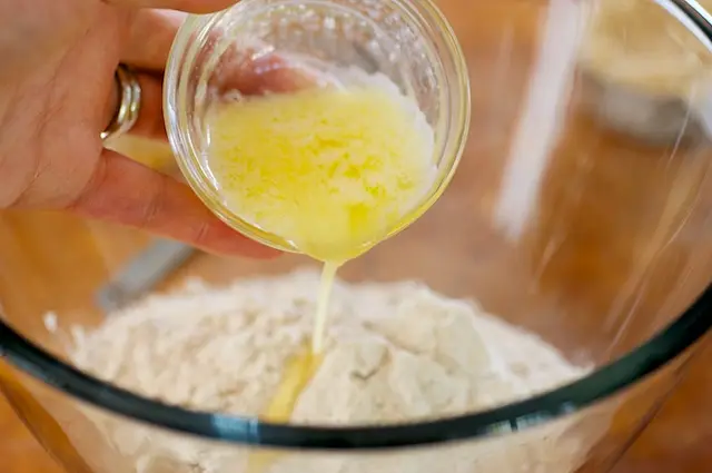 Pour in the melted butter.