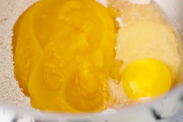 Add the mashed sweet potato or pumpkin pack, and the egg.