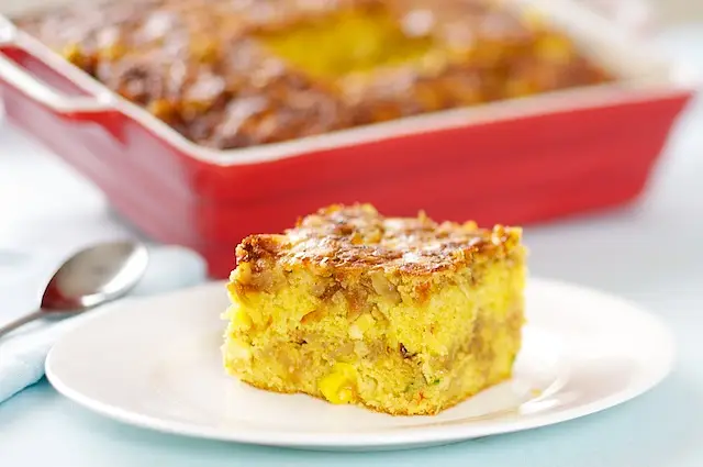 Cut into squares and serve warm.