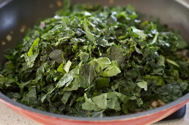 Add the stemmed and chopped kale leaves.