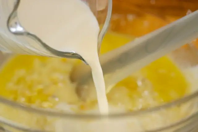 Pour in the milk.