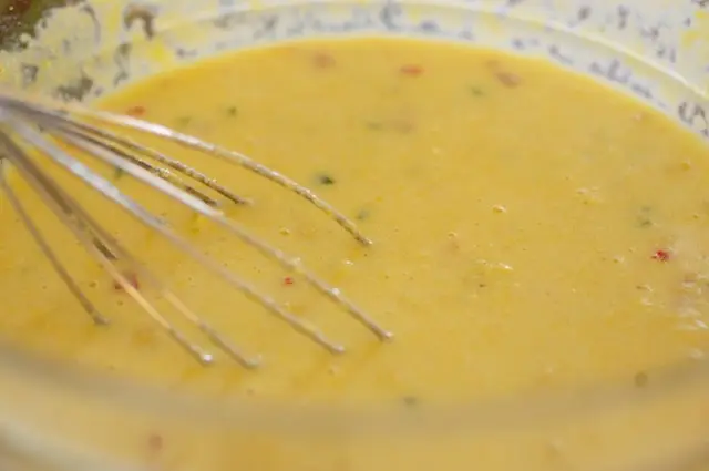 Then add the dry mixture into the liquid mixture, blending thoroughly. 