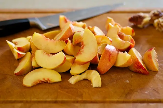 Slice the peaches into ½-inch slices.