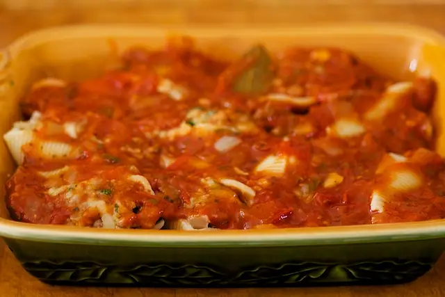 Pour remaining sauce over the stuffed shells