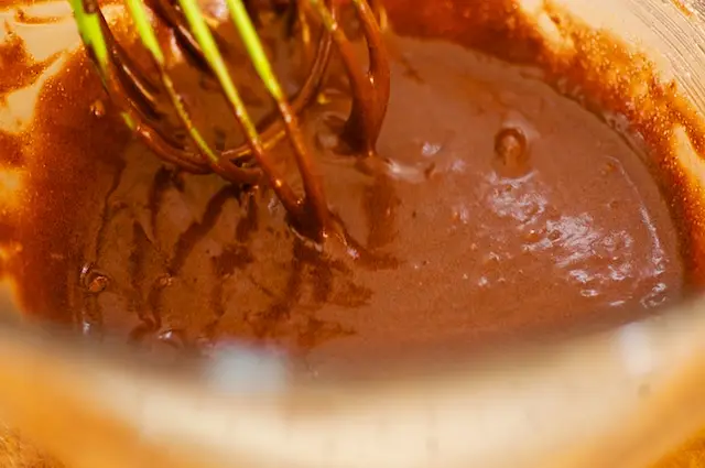 Stir in the cooled chocolate until blended. 