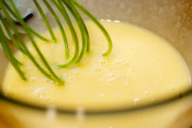 Beat or whisk until well blended. Set aside.