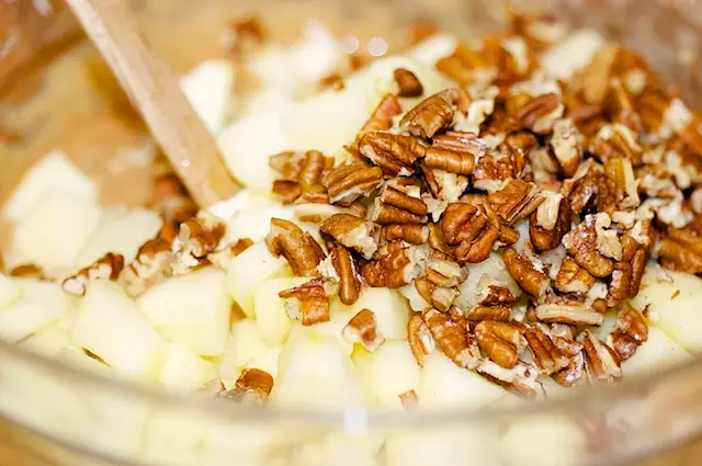 Add the apples and pecans, and mix well.