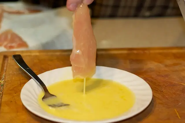 Dip chicken pieces in egg mixture and shake off excess. 