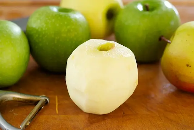 Peel the apples.