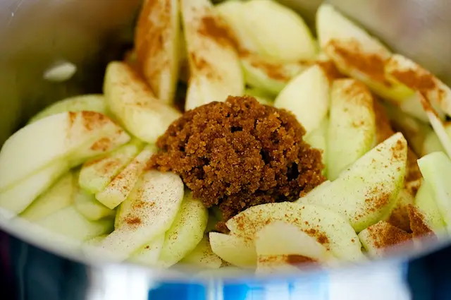 Add apples, sugar and cinnamon.